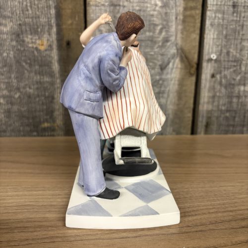 A Collection of Four Norman Rockwell Inspired Porcelain Figurines by Gorham and The Norman Rockwell Museum