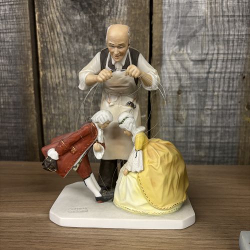 A Collection of Norman Rockwell Inspired Bisque Porcelain Figurines by Gorham and The Norman Rockwell Museum