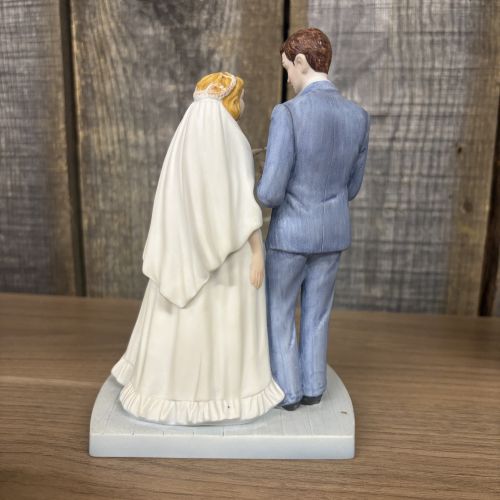 A Collection of Norman Rockwell Inspired Bisque Porcelain Figurines by Gorham and The Norman Rockwell Museum