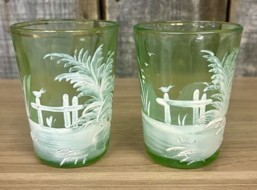 A Pair of Antique Mary Gregory Green Glass Shot Glasses