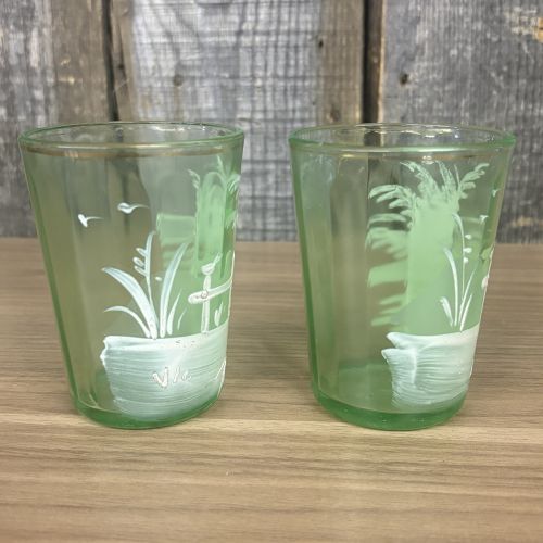 A Pair of Antique Mary Gregory Green Glass Shot Glasses