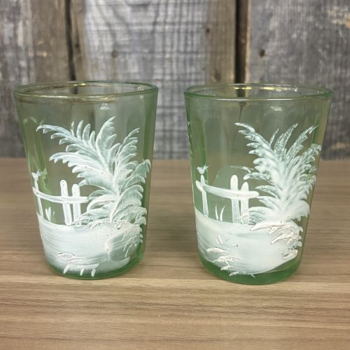 A Pair of Antique Mary Gregory Green Glass Shot Glasses