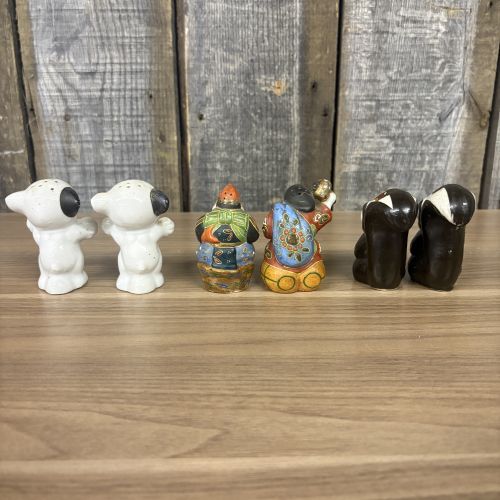 An Assortment of Vintage Ceramic Figural Salt and Pepper Shakers Including Bonzo Dogs and Japanese Deities