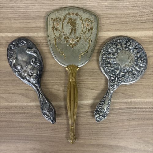 A Trio of Vintage Silver-Plated and Gold-Tone Hand Mirrors and Brush Handle