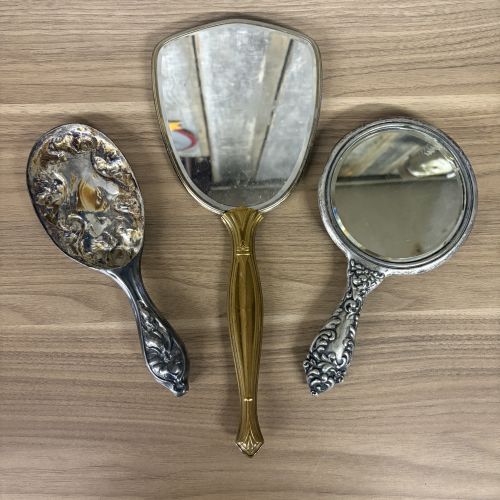 A Trio of Vintage Silver-Plated and Gold-Tone Hand Mirrors and Brush Handle