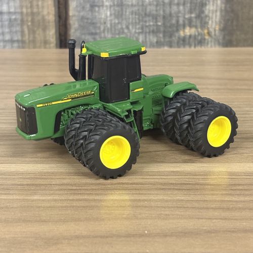 Five Toy Vehicles Including Ertl John Deere Tractors and a Matchbox Lesney Road Roller