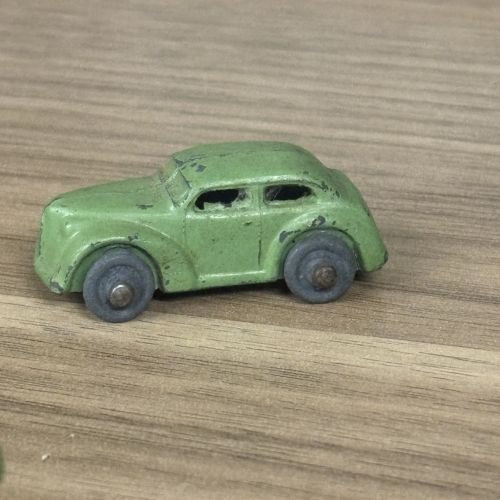 Five Toy Vehicles Including Ertl John Deere Tractors and a Matchbox Lesney Road Roller