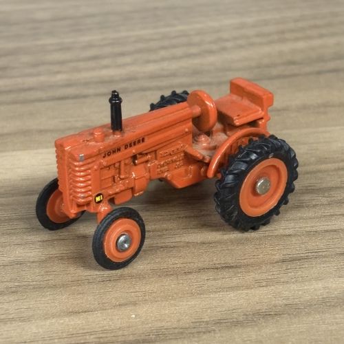 Five Toy Vehicles Including Ertl John Deere Tractors and a Matchbox Lesney Road Roller