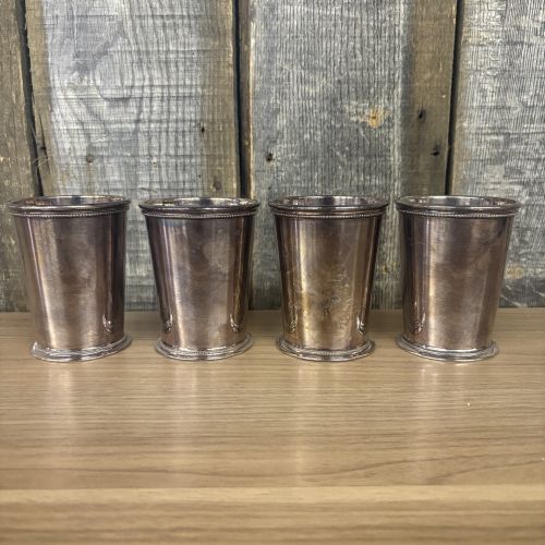A Set of Four Barker Ellis Silver Plated Patrick Henry Mint Julep Cups