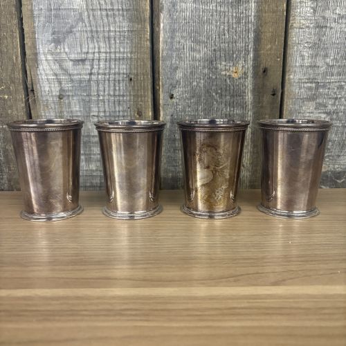 A Set of Four Barker Ellis Silver Plated Patrick Henry Mint Julep Cups