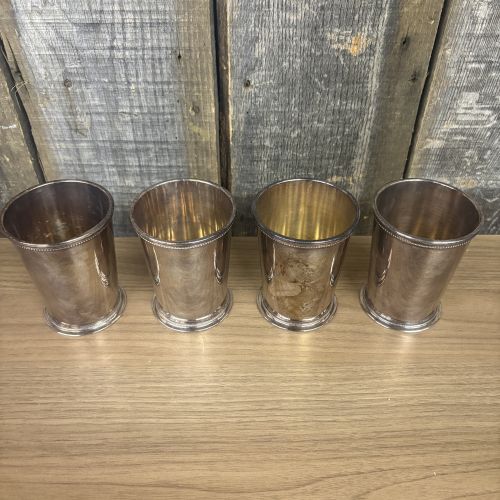 A Set of Four Barker Ellis Silver Plated Patrick Henry Mint Julep Cups