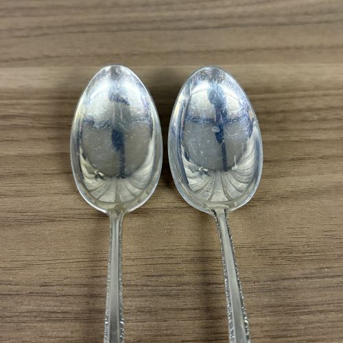 A Pair of Towle Sterling Silver Spoons in the Candlelight Pattern