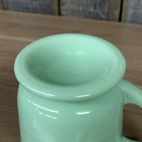 Two Pieces of Fire-King Jade-ite Glassware Including 1-Quart Measuring Pitcher and Batter Bowl