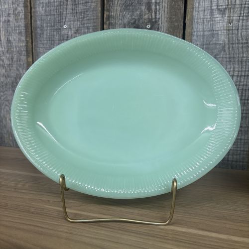 A Trio of Fire-King Jadeite Glass Tableware Including Jane Ray and Swirl Patterns