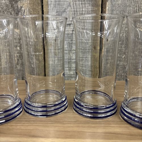 A Set of Six Fiesta Clear Glass Tumblers with Cobalt Blue Ringed Bases