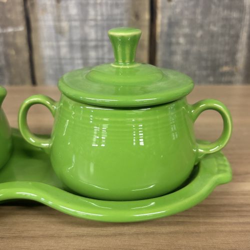 A Homer Laughlin Fiesta Chartreuse Figure Eight Creamer and Sugar Set