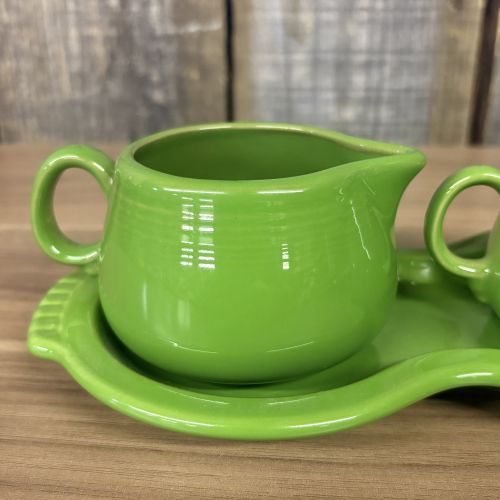 A Homer Laughlin Fiesta Chartreuse Figure Eight Creamer and Sugar Set