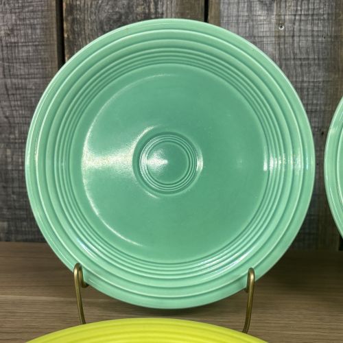 A Set of Four Homer Laughlin Fiesta Salad Plates in Seafoam and Chartreuse