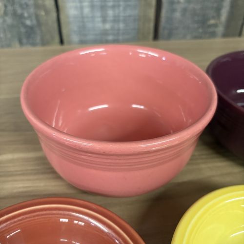 A Set of Five Homer Laughlin Fiestaware Ceramic Bowls and Dishes in Various Colors