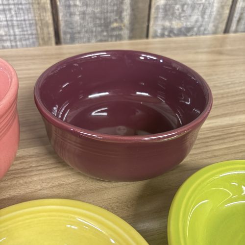 A Set of Five Homer Laughlin Fiestaware Ceramic Bowls and Dishes in Various Colors