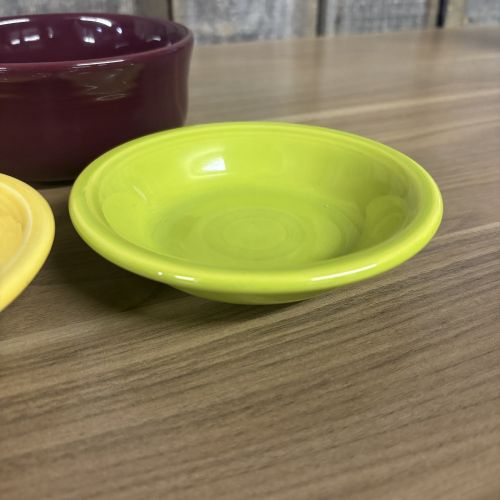 A Set of Five Homer Laughlin Fiestaware Ceramic Bowls and Dishes in Various Colors