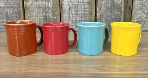 A Set of Homer Laughlin Fiesta Ceramic Mugs in Various Colors
