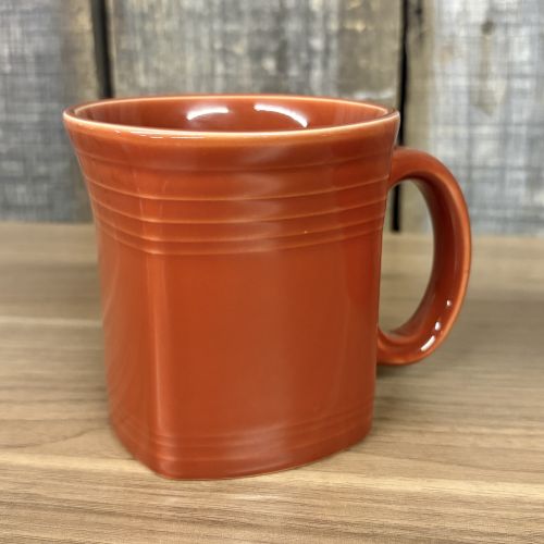 A Set of Homer Laughlin Fiesta Ceramic Mugs in Various Colors