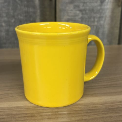 A Set of Homer Laughlin Fiesta Ceramic Mugs in Various Colors