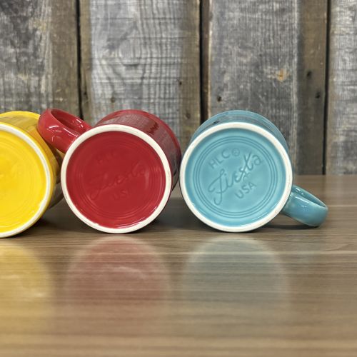 A Set of Homer Laughlin Fiesta Ceramic Mugs in Various Colors