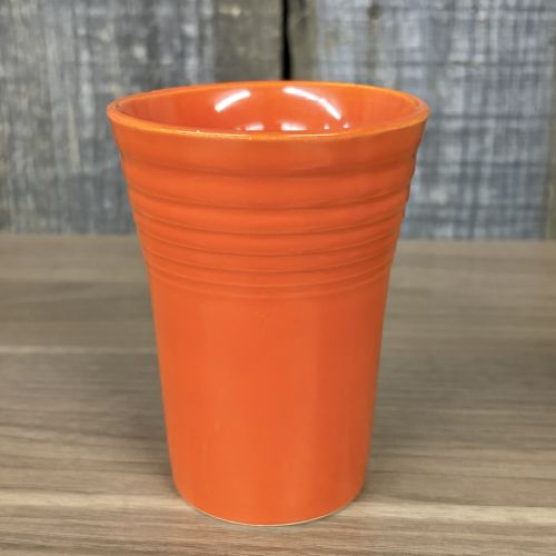 A Collection of Homer Laughlin Fiestaware including a Ring Handle Mug and Water Tumblers