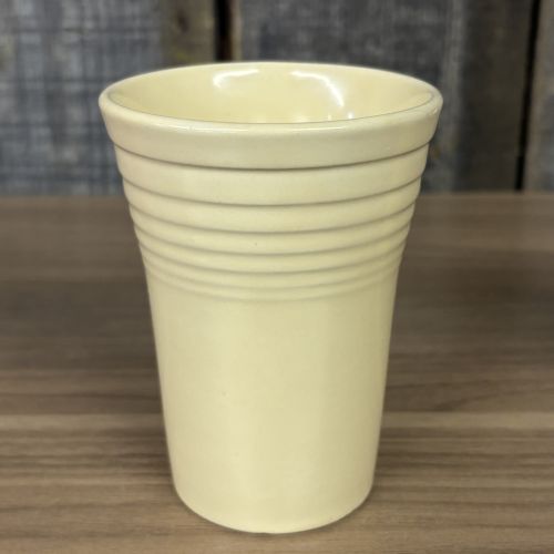 A Collection of Homer Laughlin Fiestaware including a Ring Handle Mug and Water Tumblers
