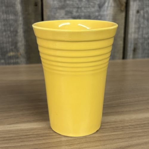 A Collection of Homer Laughlin Fiestaware including a Ring Handle Mug and Water Tumblers