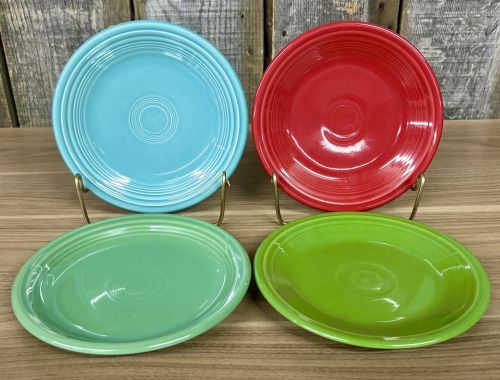 A Set of Four Homer Laughlin Fiesta Glazed Earthenware Bread and Butter Plates