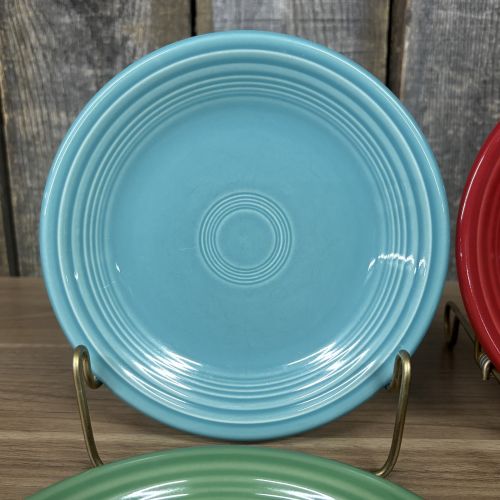 A Set of Four Homer Laughlin Fiesta Glazed Earthenware Bread and Butter Plates