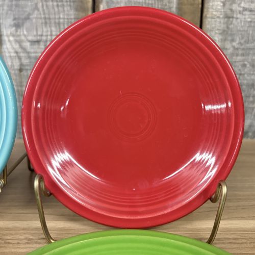 A Set of Four Homer Laughlin Fiesta Glazed Earthenware Bread and Butter Plates