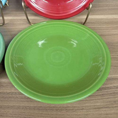 A Set of Four Homer Laughlin Fiesta Glazed Earthenware Bread and Butter Plates