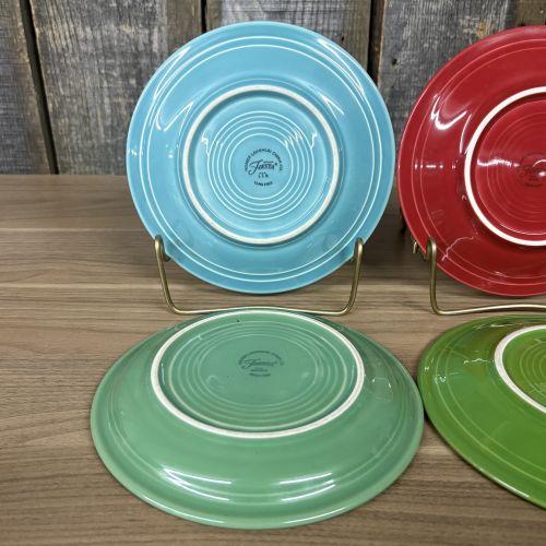 A Set of Four Homer Laughlin Fiesta Glazed Earthenware Bread and Butter Plates