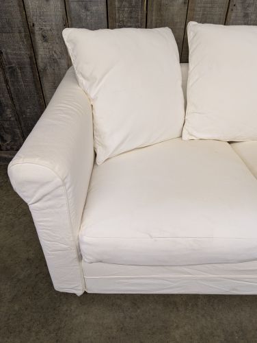 Contemporary Slipcovered Two Seat Sofa with Rolled Arms