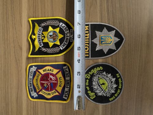 A Lot of Four Assorted Contemporary Embroidered Emergency Service and Commemorative Patches