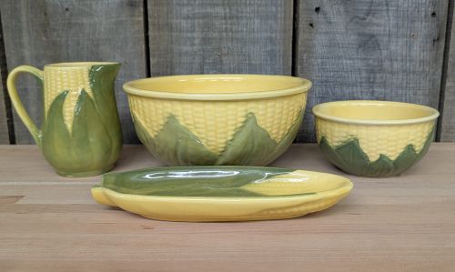 A Set of Four Shawnee Pottery Corn King Pattern Kitchenware Pieces