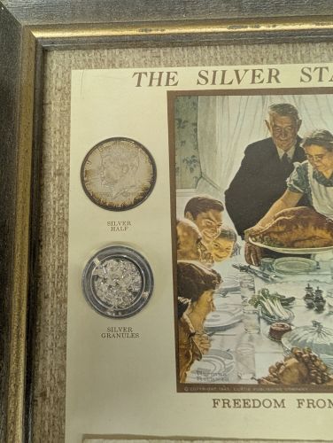 A 1974 Kennedy Mint The Silver Standard Framed Collection of US Coins and Currency