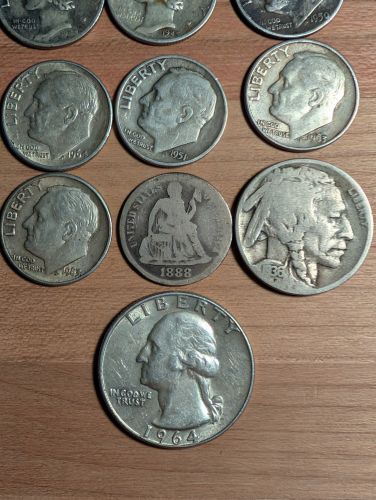A Collection of US Coins including 90% Silver Issues and Seated Liberty Dime