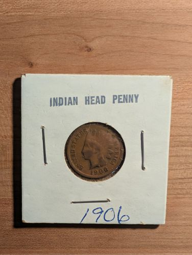 A Collection of Seven US Indian Head Pennies, 1900-1906