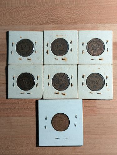 A Collection of Seven US Indian Head Pennies, 1900-1906