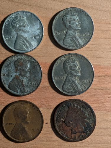 A Group of US One-Cent Coins Including Lincoln Steel and Indian Head Cents
