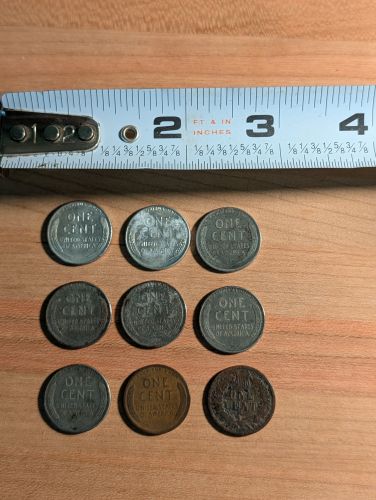 A Group of US One-Cent Coins Including Lincoln Steel and Indian Head Cents