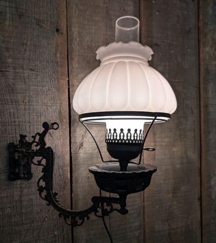 Electrified Victorian Style Cast Iron Swivel Wall Sconce with Milk Glass Melon Shade