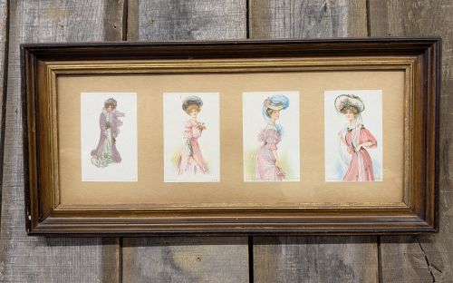 A Collection of Four Edwardian Fashion Prints in a Wood Frame
