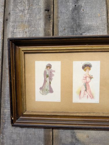 A Collection of Four Edwardian Fashion Prints in a Wood Frame