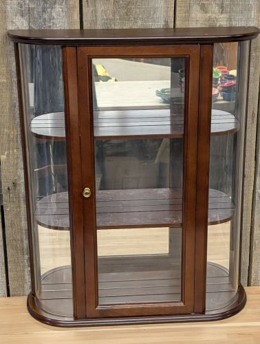The Bombay Company Mahogany Tone Bow Front Wall Curio Cabinet with Decorative Brackets